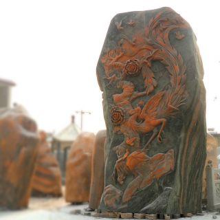 动物石雕凤凰供货厂家晚霞红凤凰浮雕