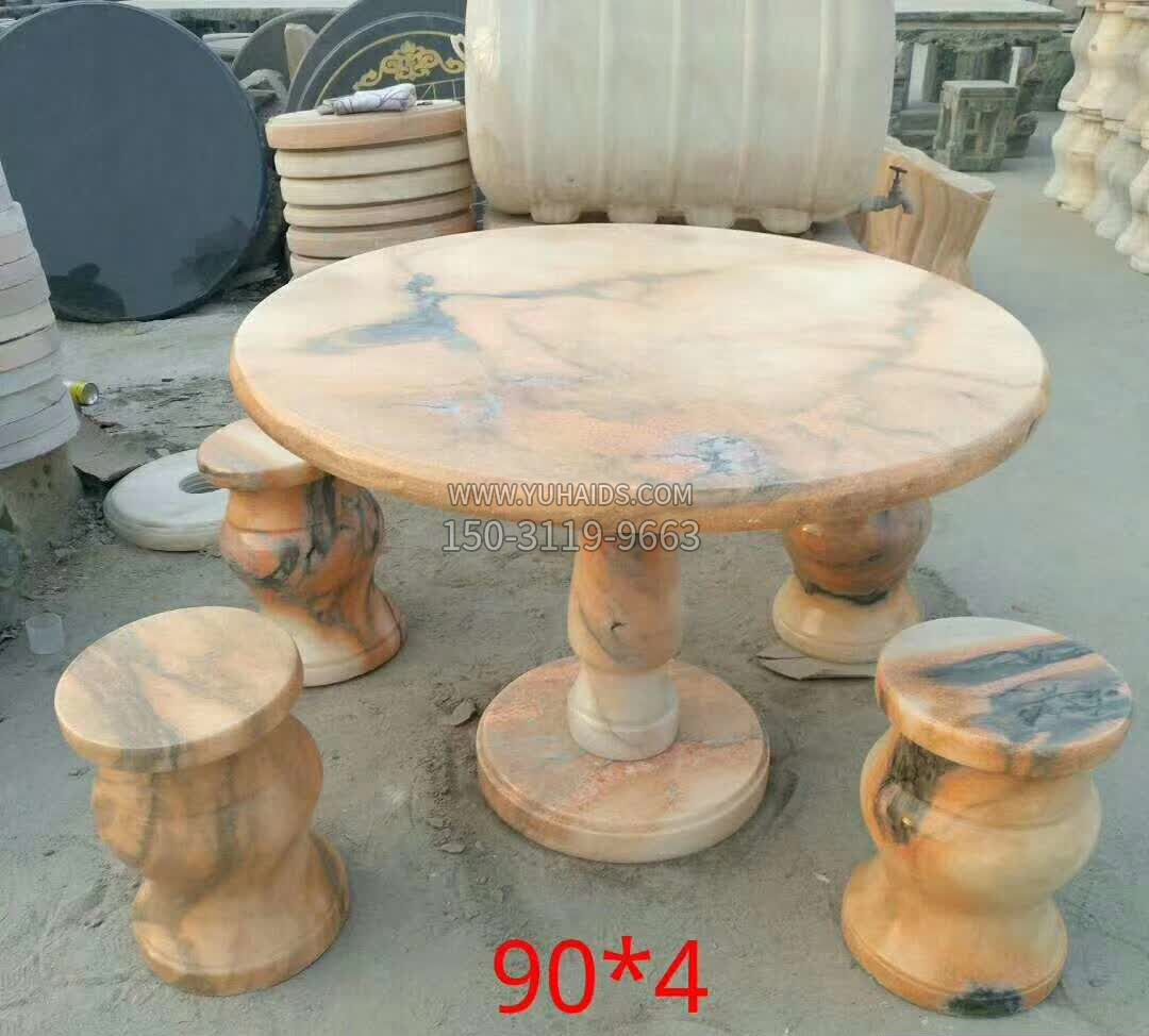 晚霞红石桌凳雕塑