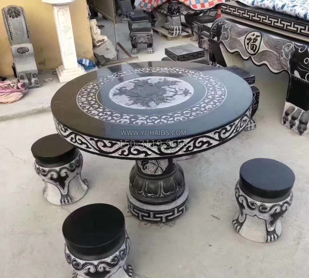 圆形石桌凳雕塑