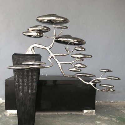 详解镜面不锈钢迎客松雕塑的制作工艺