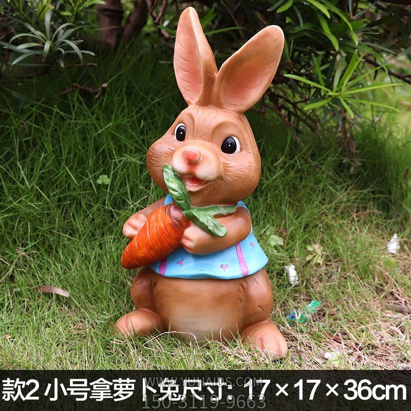 幼儿园一只拿胡萝卜的卡通兔子雕塑