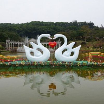 景区池塘大型玻璃钢抽象爱心天鹅雕塑