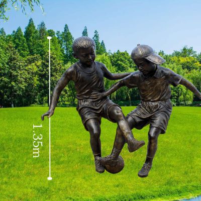 踢足球的小男孩运动人物雕塑