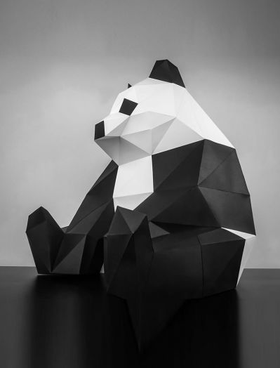 售楼部室内摆放侧坐潮流熊猫玻璃钢雕塑
