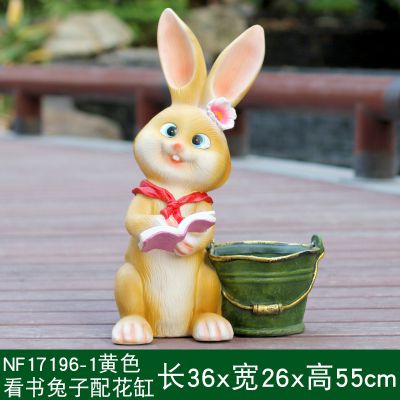 图书馆一只看书的黄色玻璃钢兔子雕塑