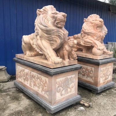 晚霞红石雕浮雕庭院狮子雕塑