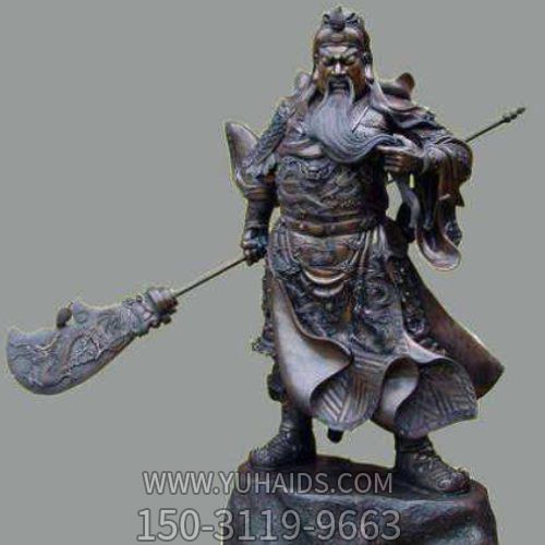 古铜关公像，右手持刀左手捻须站立的关于铜雕像雕塑