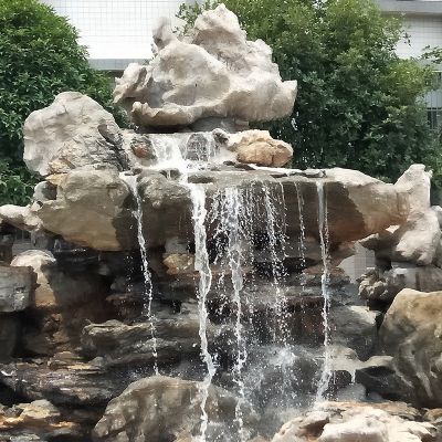 公园景区石雕流水的太湖石雕塑
