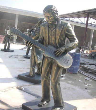公园弹吉他的西方人物铜雕弹雕塑