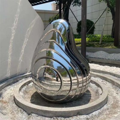镜面不锈钢进门切割创意鹅卵石雕塑