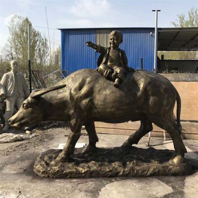 户外园林玻璃钢仿铜坐在 牛背上的儿童景观雕塑