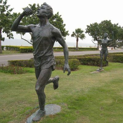 城市公园摆放玻璃钢仿铜跑步运动人物雕塑