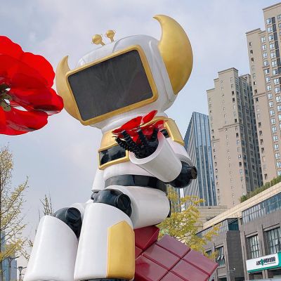 手拿花朵的不锈钢户外广场大型彩绘机器人
