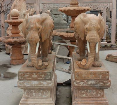 庭院寺庙晚霞红石雕大象雕塑