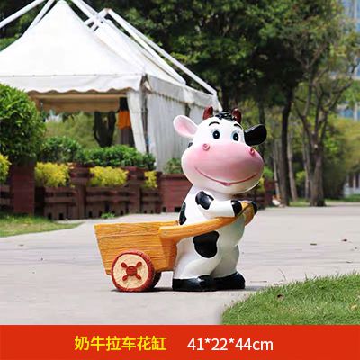 农场一只拉车的玻璃钢牛雕塑