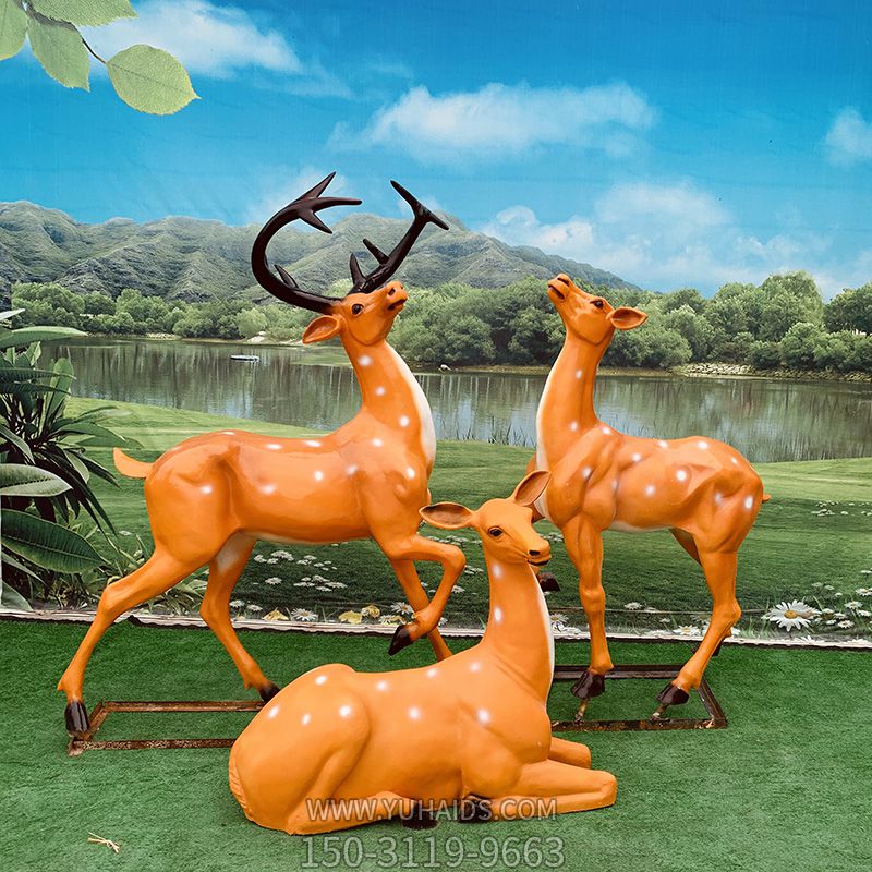 玻璃钢彩绘景区三只橙色梅花鹿雕塑