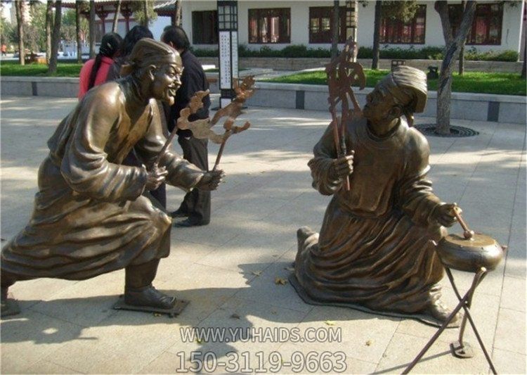 步行街玻璃钢仿铜表演皮影戏古人景观雕塑