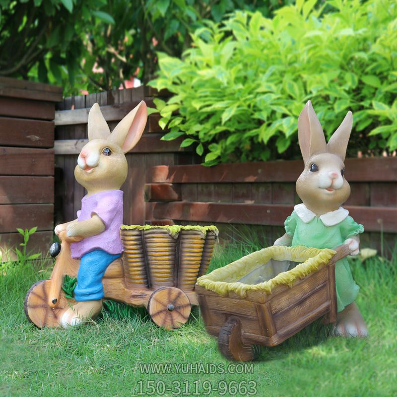 户外园林玻璃骑着车的兔子雕塑