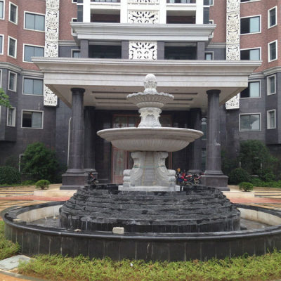 办公大楼大门前的喷泉水钵，双层石雕流水钵
