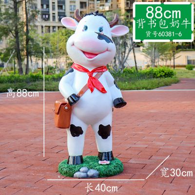 幼儿园一只背书包的玻璃钢牛雕塑