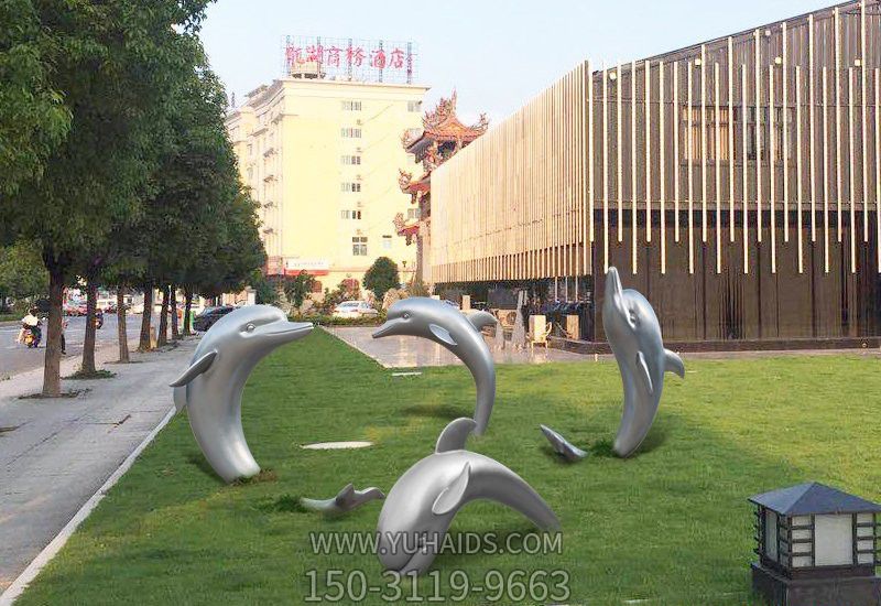 草坪四只姿态各异的不锈钢海豚雕塑