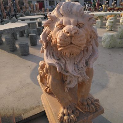 公园创意晚霞红石雕坐着的狮子雕塑