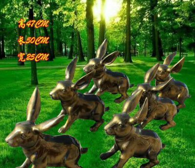 森林一群奔跑的不锈钢兔子雕塑