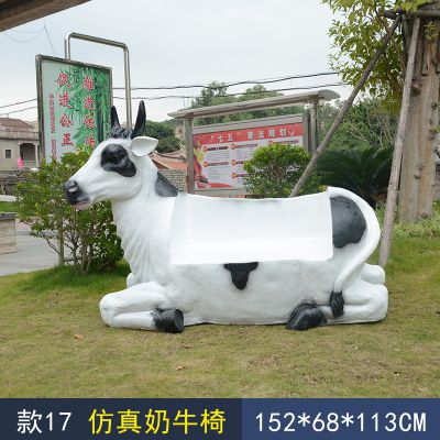 商场中一只仿真奶牛座椅玻璃钢牛雕塑
