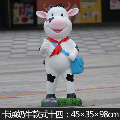 商店一只背书包站立的玻璃钢牛雕塑