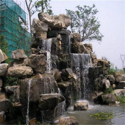 千层石假山流水瀑布别墅花园浴池景观石