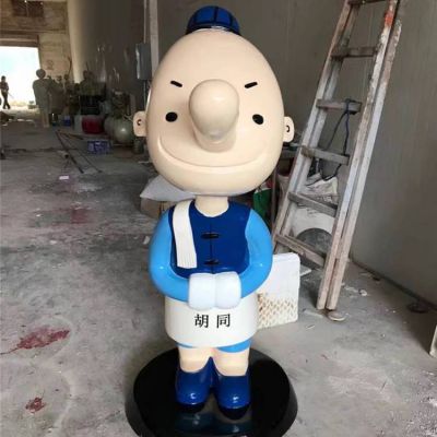 饭店门前摆放玻璃钢迎宾卡通公仔雕塑