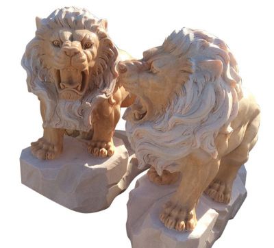 景区创意晚霞红一对怒吼的狮子雕塑