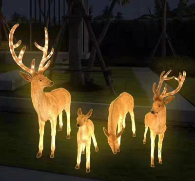 城市街道创意照明发光的梅花鹿雕塑