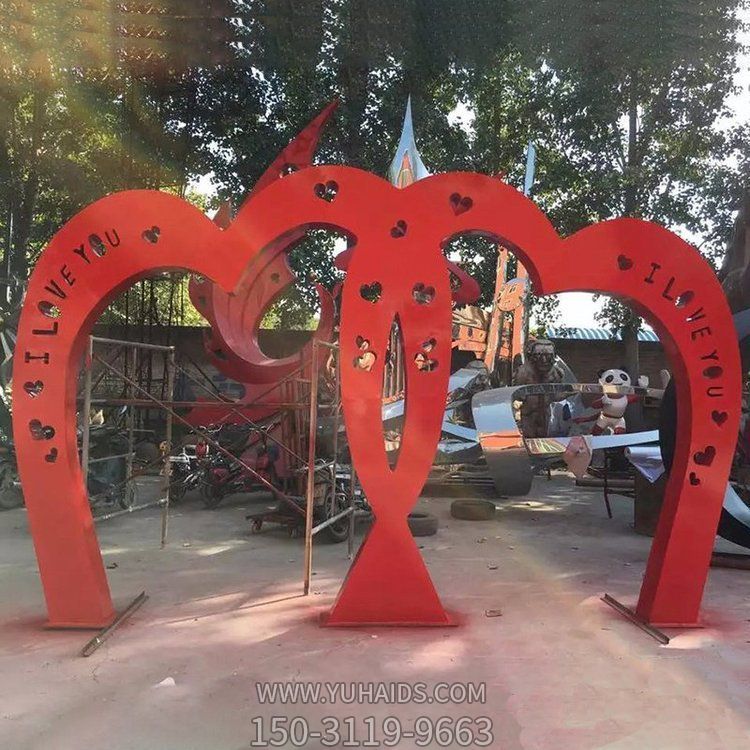 景区公园不锈钢镂空喷漆心形拱门雕塑