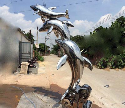农场三只跳跃的不锈钢海豚雕塑
