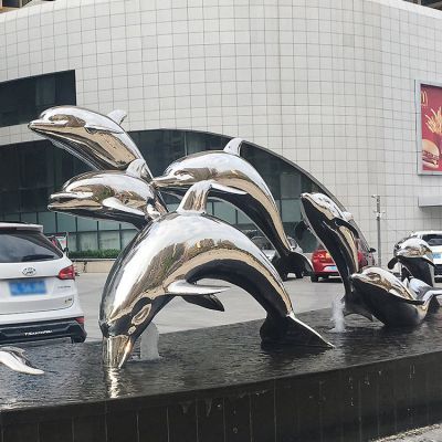 广场水池摆放不锈钢镜面海豚群景观雕塑