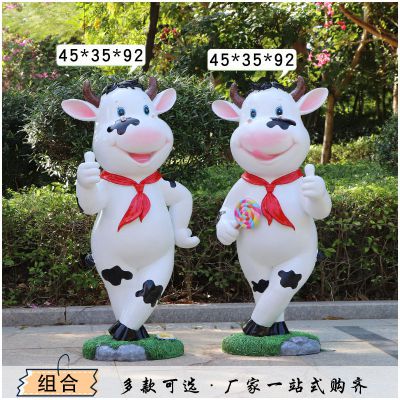 树林站立两个点赞的玻璃钢牛雕塑