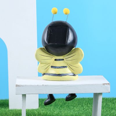 儿童游乐园背靠朝前坐在椅子上可爱树脂蜜蜂摆件雕塑