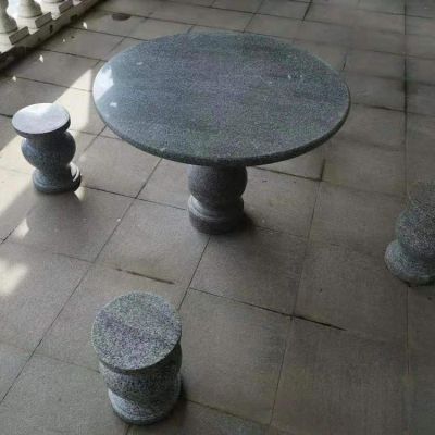 家用大理石黑雕刻圆形休闲石桌石凳