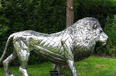 公园草坪创意不锈钢切面仿真狮子雕塑