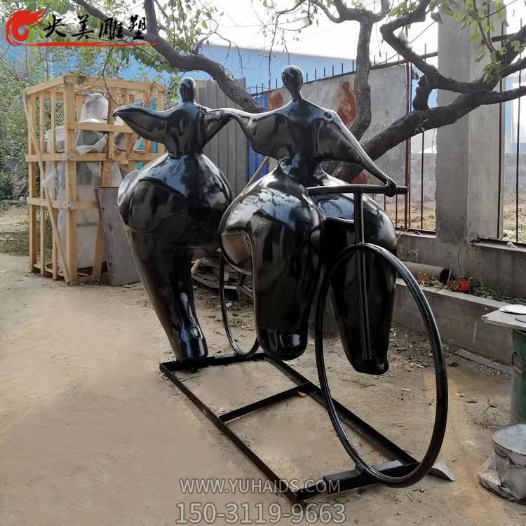 玻璃钢仿铜户外公园广场抽象骑自行车的人物雕塑