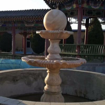 中式庭院水池摆放晚霞红雕刻二层风水球
