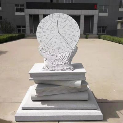 校园汉白玉浮雕书本上的日晷雕塑