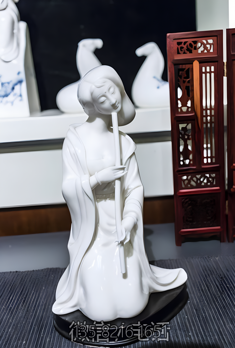 汉白玉吹箫的古代美女石雕