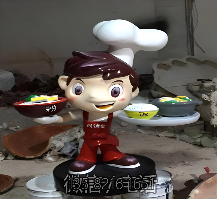 饭店端盘子上菜的卡通厨师小子雕塑