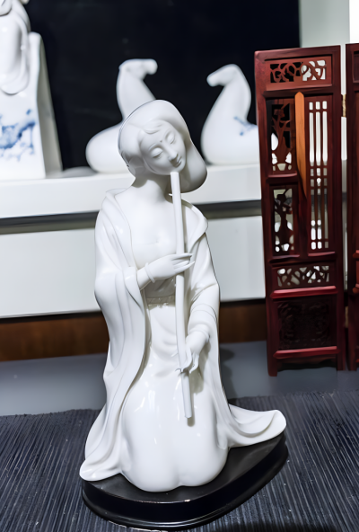 汉白玉吹箫的古代美女石雕