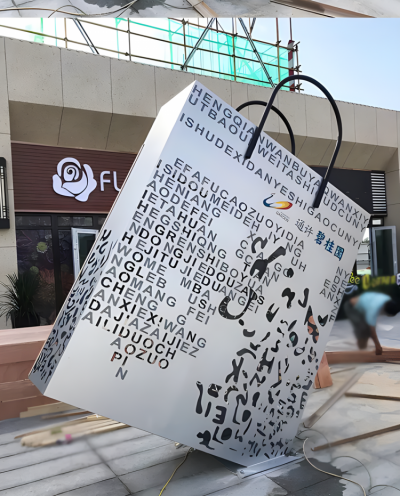 镂空刻字大型不锈钢购物袋雕塑